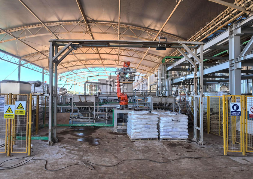 尿素顆粒自動(dòng)拆垛拆包機(jī) 尿素全自動(dòng)拆包機(jī)械手現(xiàn)場